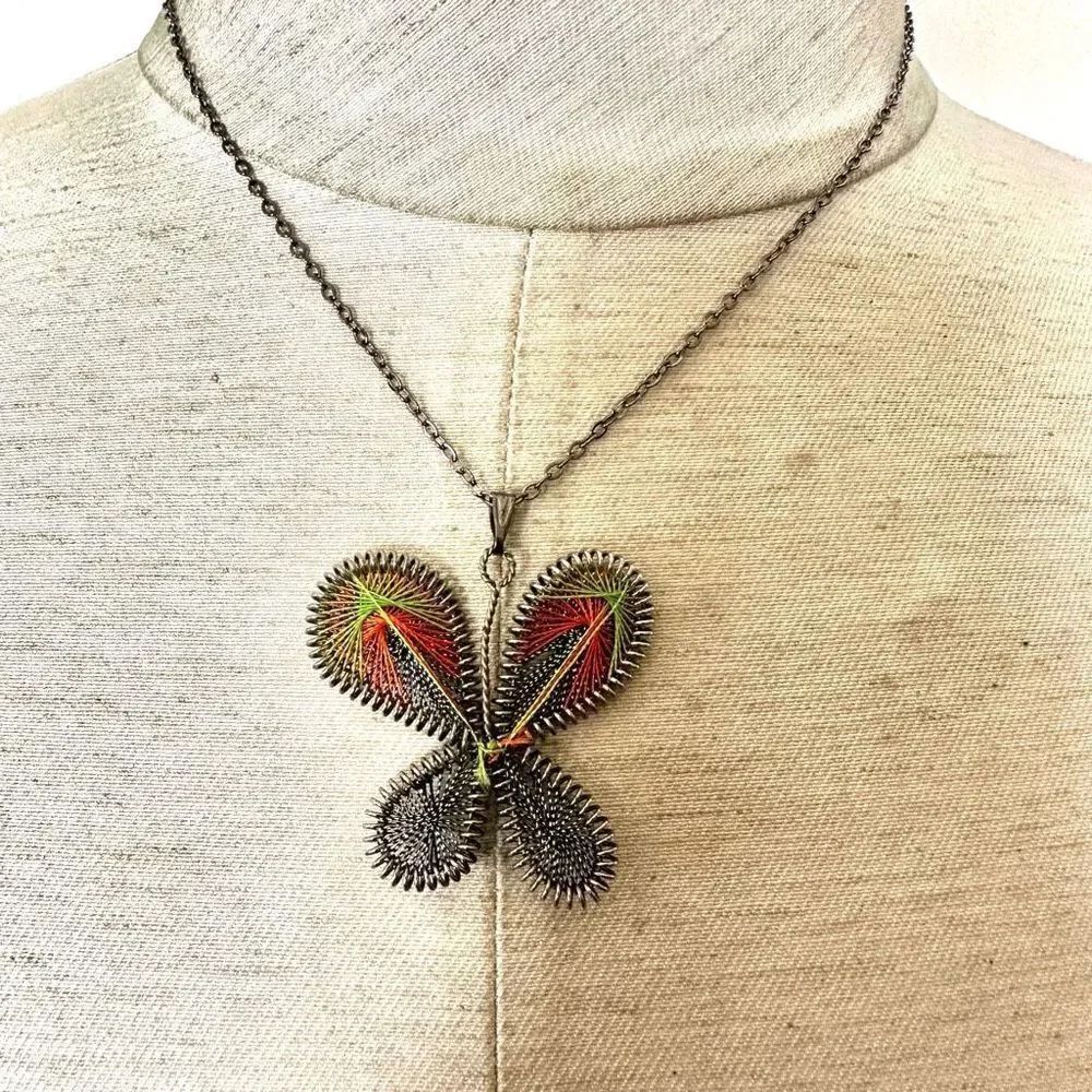 Silver tone threaded butterfly pendant necklace